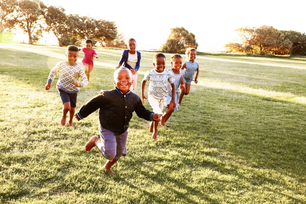 Children Running in an Open Field