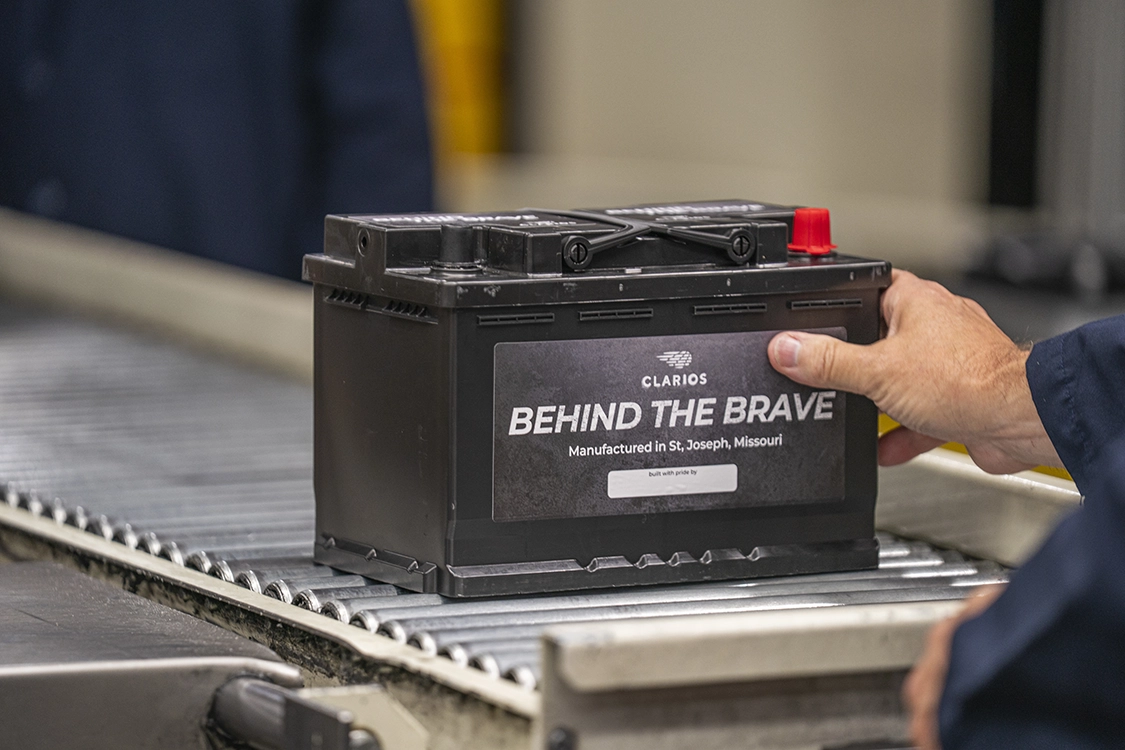 behind the brave battery on conveyor