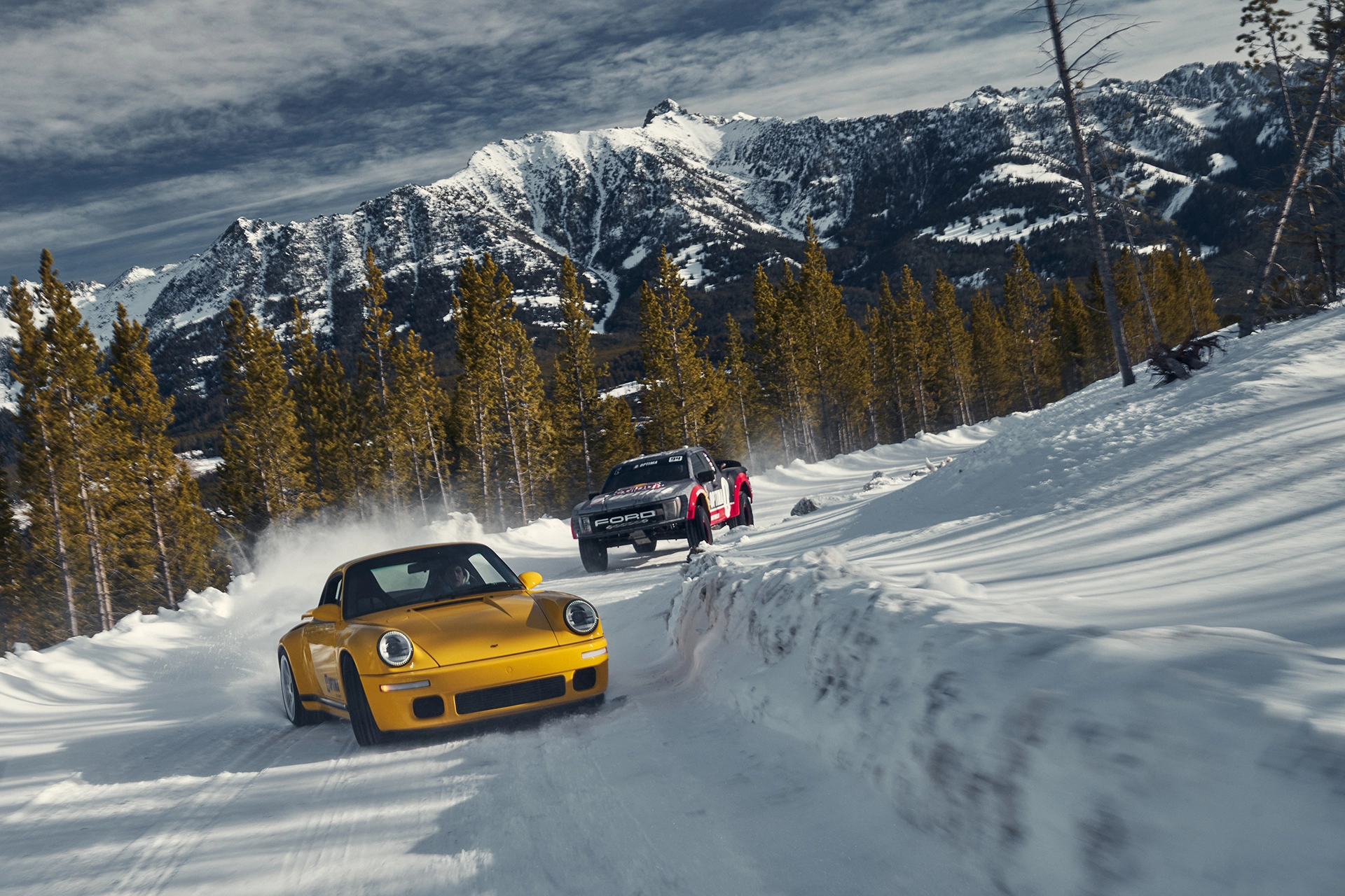 yellow porsche on track with optima racing truck