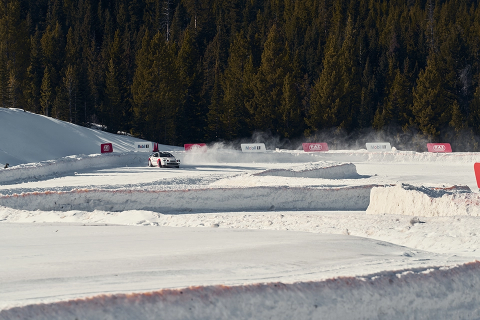 car racing through track at ice race
