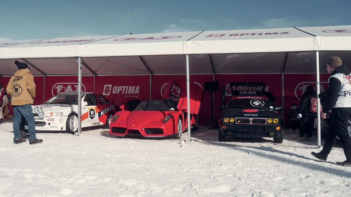 lines of cars under tent