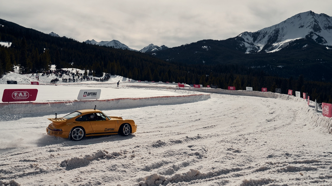 yellow Porsche at Big Sky Ice Race