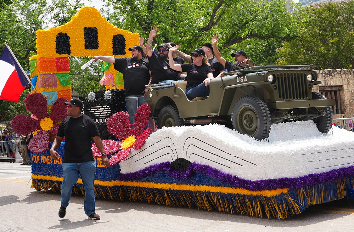 Clarios float at Battle of Flowers Parade