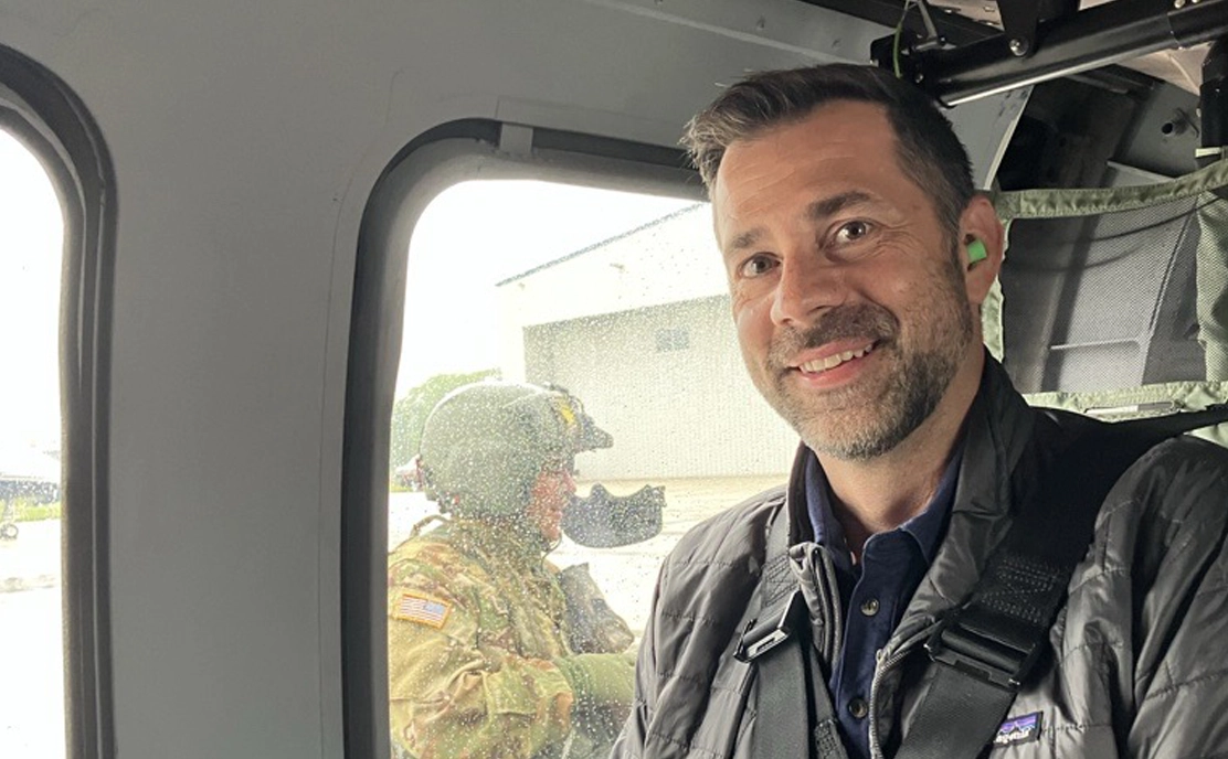 Dean Nemecek in helicopter