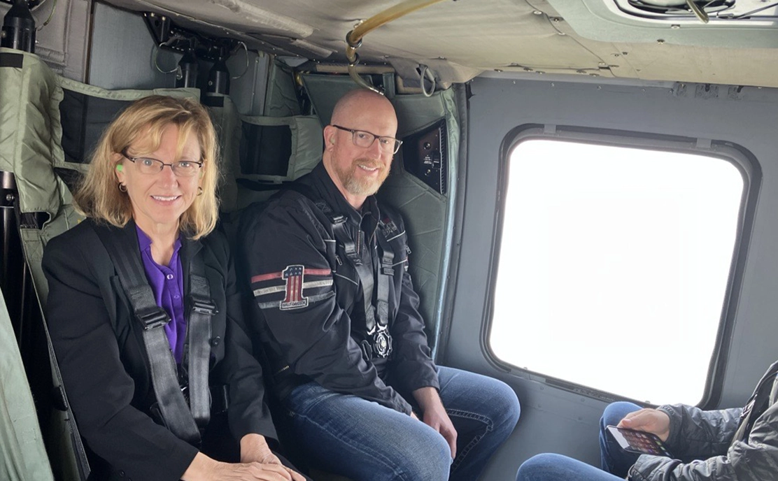 elizabeth and helmut in helicopter