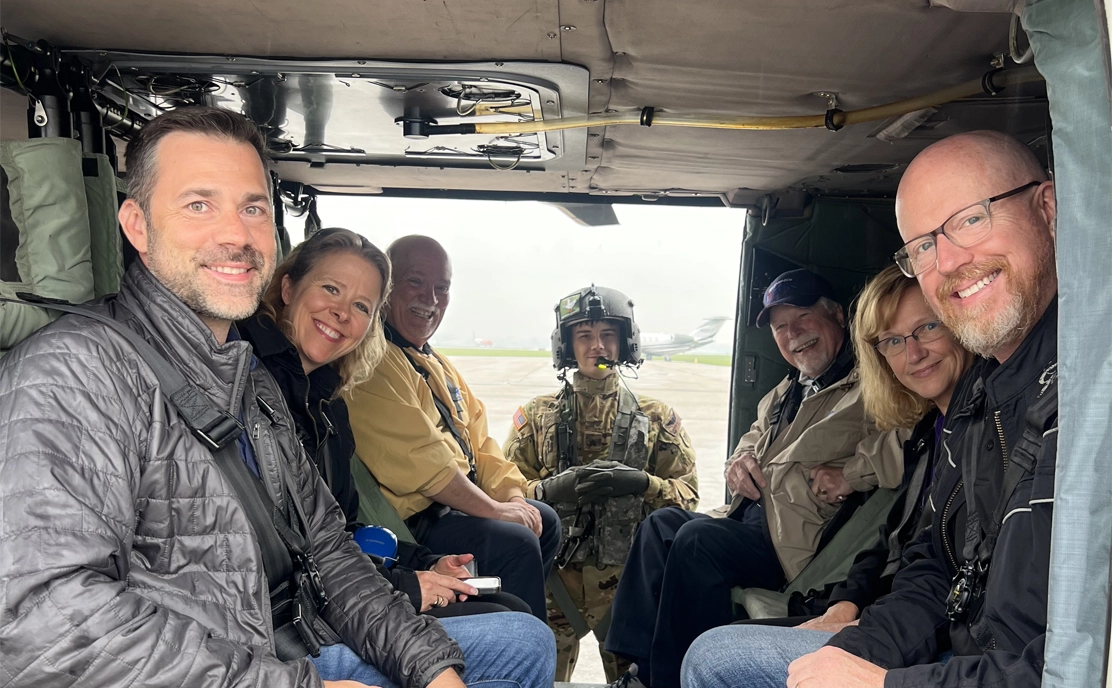 group photo in helicopter