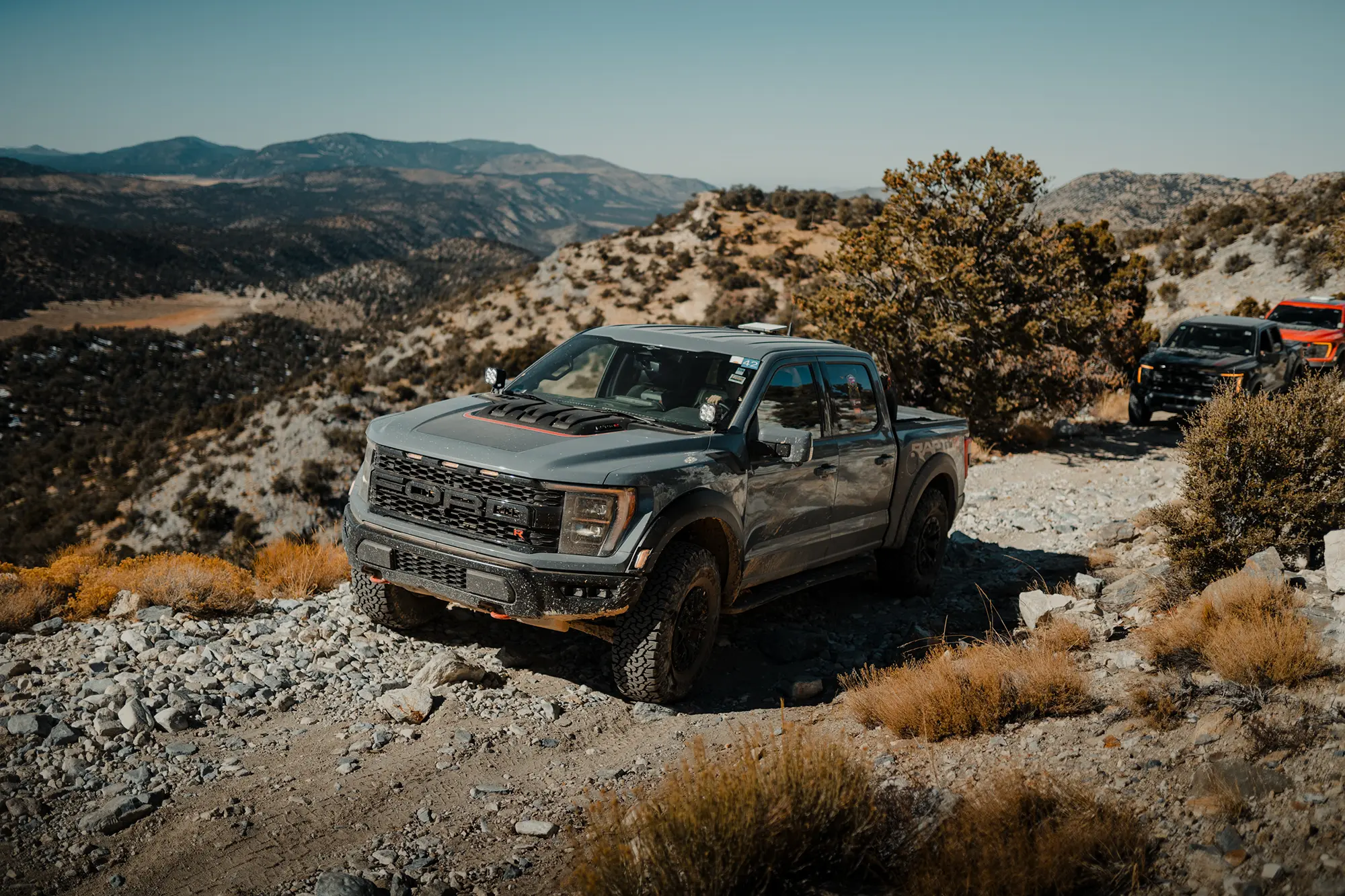 ford trucks riding through trail