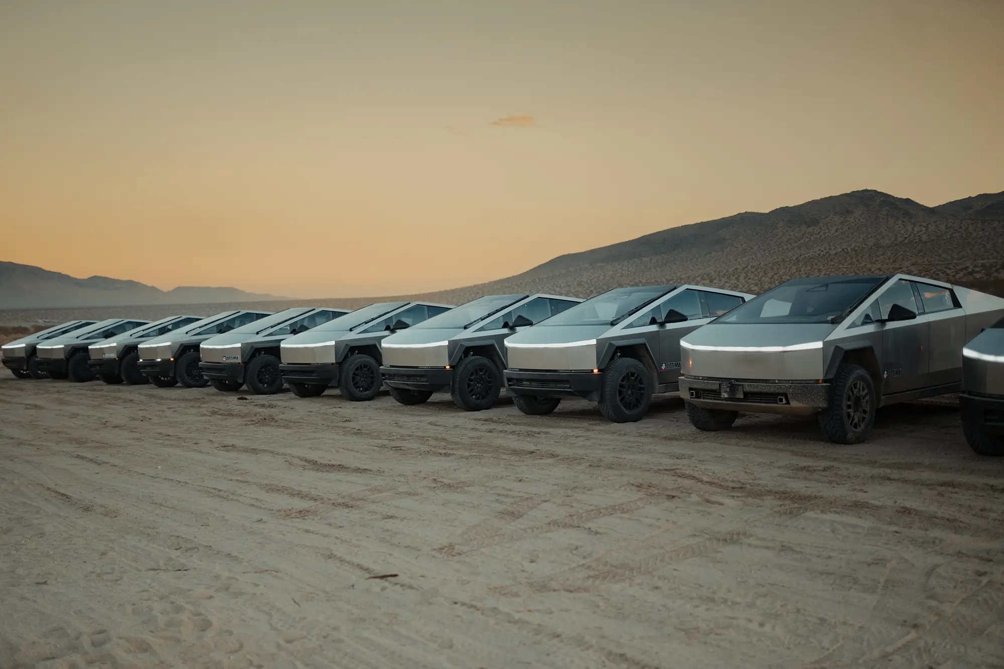 cybertrucks lined up horizon