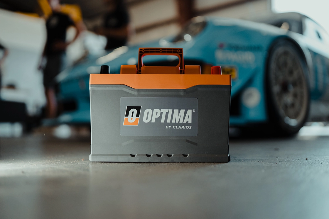 optima orangetop qh6 in front of porsche carrera