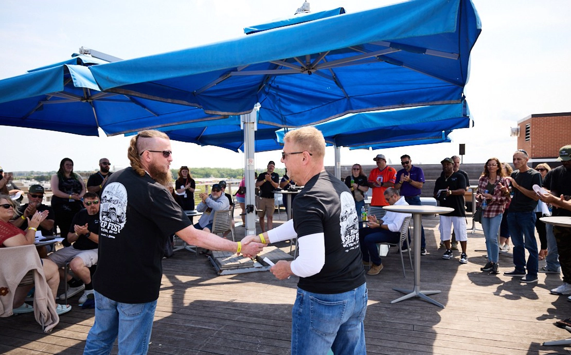 veterans speaking at rooftop event
